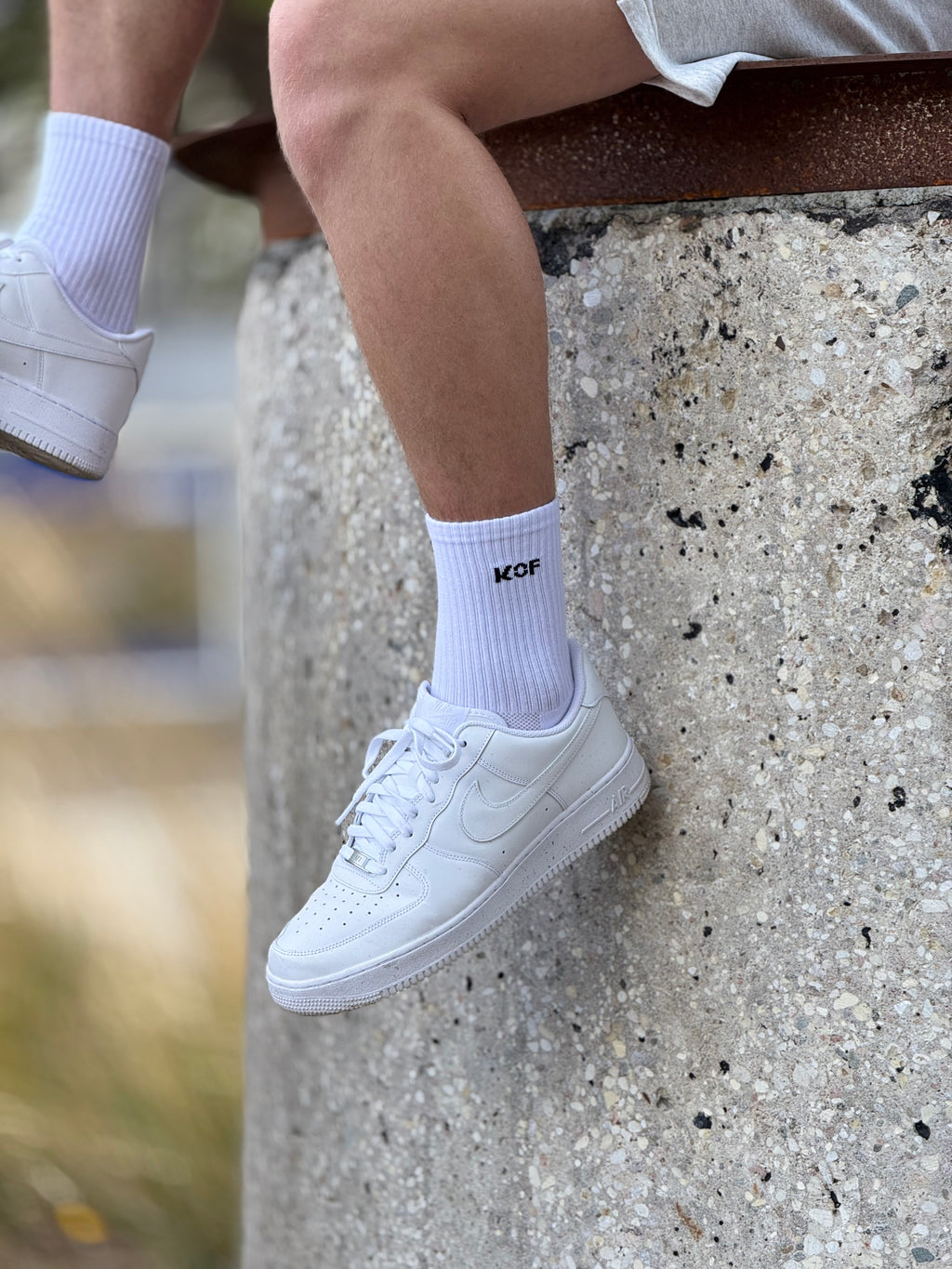KOF Unisex zeķes baltas ar melnu uzrakstu OEKO-TEX®